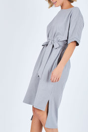 Model Chelsea wearing size 10 of The Straight Hem Day Dress in colour Grey (Grey), from the front, cropped image