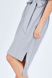 Model Chelsea wearing size 10 of The Straight Hem Day Dress in colour Grey (Grey), from the front, cropped image