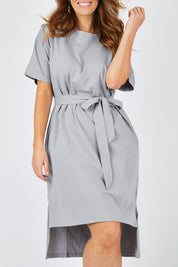 Model Laura wearing size 14 of The Straight Hem Day Dress in colour Grey (Grey), from the front, cropped image