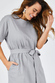 Model Laura wearing size 14 of The Straight Hem Day Dress in colour Grey (Grey), from the front, cropped image