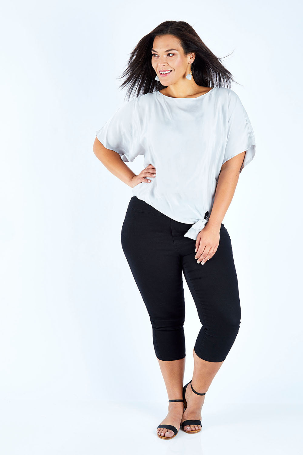 Model Lauren wearing size 18 of The Luxe Tie Front Top in colour Silver (Grey), from the front, showing the whole outfit