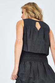 Model Chelsea wearing size 10 of The Overlay Maxi Dress in colour Black (Black), from the back