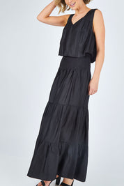 Model Chelsea wearing size 10 of The Overlay Maxi Dress in colour Black (Black), from the front, cropped image