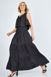 Model Chelsea wearing size 10 of The Overlay Maxi Dress in colour Black (Black), from the front, showing the whole outfit
