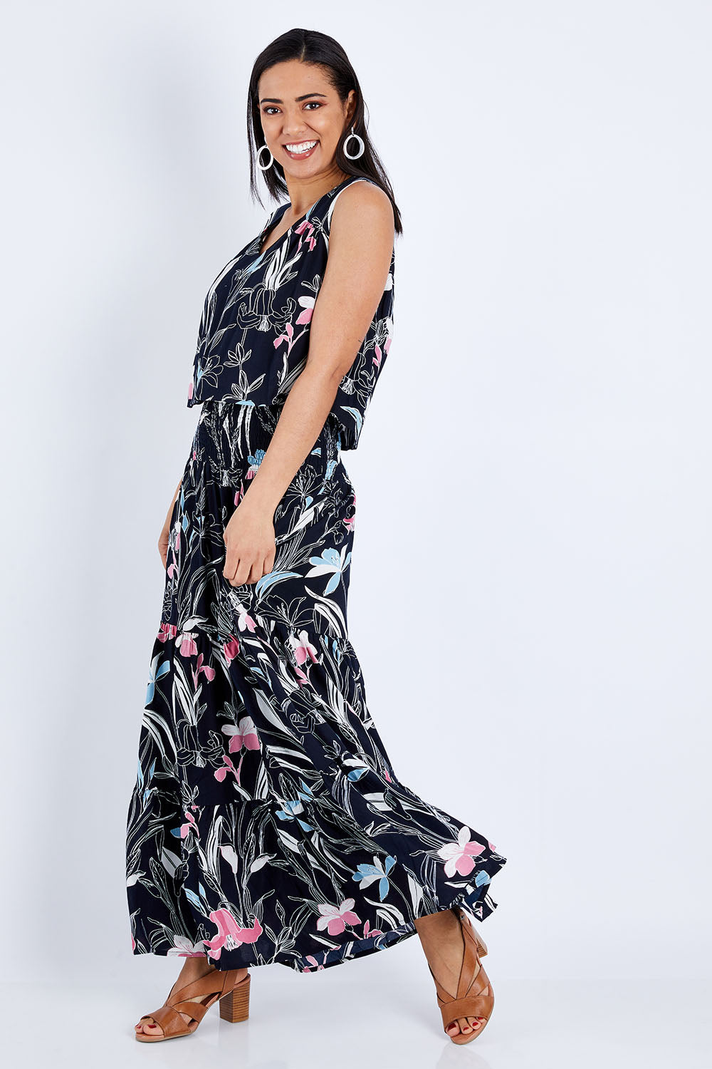 Model Pamela wearing size 10 of The Overlay Maxi Dress in colour Floral (Black), from the front, showing the whole outfit
