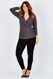 Model Kate wearing size 12 of The Wrap Jersey Top in colour Charcoal (Grey), from the front, showing the whole outfit