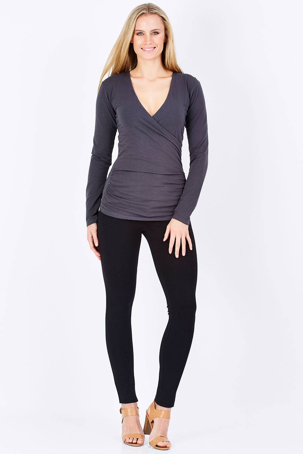 Model Maddy wearing size 10 of The Wrap Jersey Top in colour Charcoal (Grey), from the front, showing the whole outfit