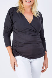 Model Natalie wearing size 16 of The Wrap Jersey Top in colour Charcoal (Grey), from the front, cropped image