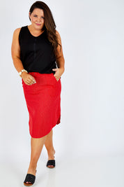 Model Stacey wearing size 16 of The Cotton Bamboo Tank in colour Black (Black), from the front, showing the whole outfit