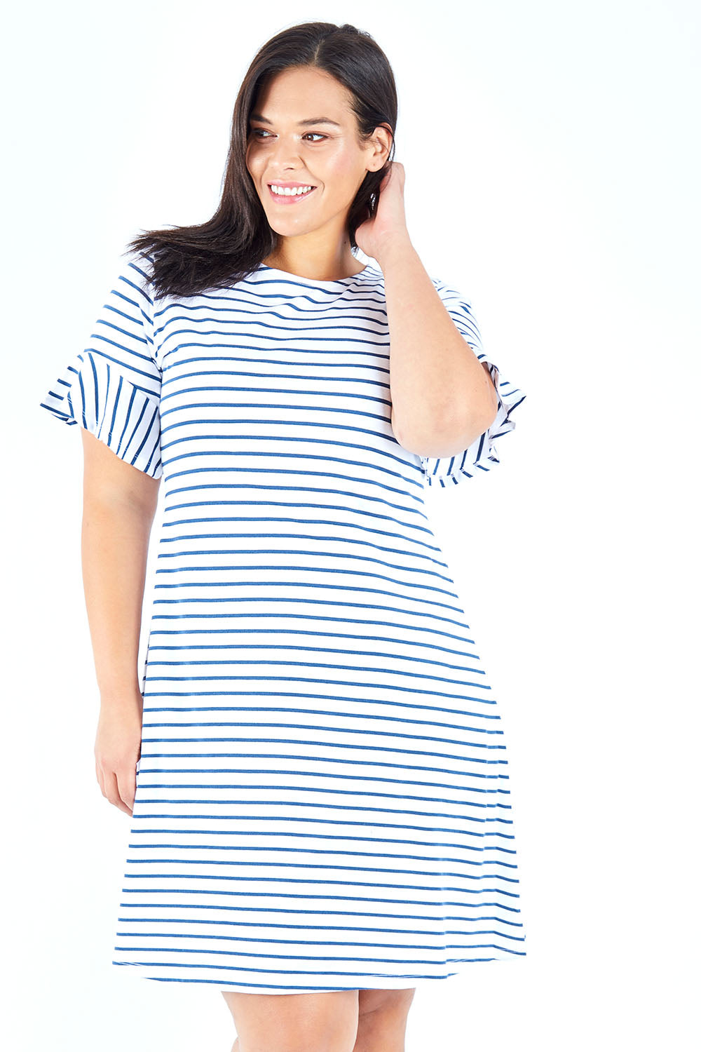 Model Lauren wearing size 18 of The Cotton Bamboo Frill Dress in colour Navystripe (Blue), from the front, cropped image