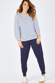 Model Laura wearing size 14 of The Cotton Bamboo L/S Top in colour NavyStripe (Blue), from the front, showing the whole outfit