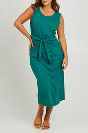 Model Monique wearing size 14 of The Tie Waist Tank Dress in colour Turquoise (Green), from the front, cropped image
