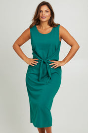 Model Monique wearing size 14 of The Tie Waist Tank Dress in colour Turquoise (Green), from the front, cropped image