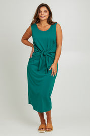 Model Monique wearing size 14 of The Tie Waist Tank Dress in colour Turquoise (Green), from the front, showing the whole outfit