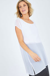 Model Chelsea wearing size 10 of The Chiffon Trim Top in colour White (White), from the front, cropped image