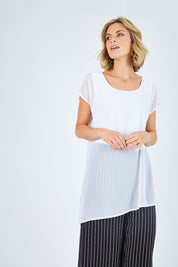 Model Chelsea wearing size 10 of The Chiffon Trim Top in colour White (White), from the front, cropped image