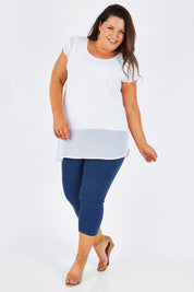 Model Stacey wearing size 16 of The Chiffon Trim Top in colour White (White), from the front, showing the whole outfit