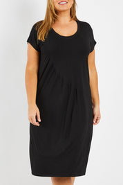 Model Fiona wearing size 16 of The Essential Tee Dress in colour Black (Black), from the front, cropped image