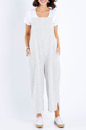 Model Andrea wearing size 10 of The Easy Day Jumpsuit in colour Whtstripe (White), from the front, cropped image