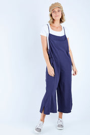 Model Chelsea wearing size 10 of The Easy Day Jumpsuit in colour Navy (Blue), from the front, showing the whole outfit