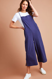 Model Madeline wearing size 10 of The Easy Day Jumpsuit in colour Navy (Blue), from the front, showing the whole outfit