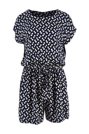Product shot of The Printed Tie Waist Playsuit in colour Multiprint (Black), from the front