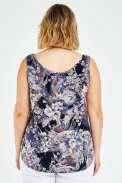 Model Jess wearing size 14 of The Reversible Tank in colour Multiprint (Blue), from the back