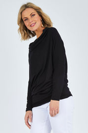 Model Chelsea wearing size 10 of The Multiin colourWay Dress - Black (Black), from the front, cropped image