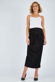 Model Chelsea wearing size 10 of The Multiin colourWay Dress - Black (Black), from the front, showing the whole outfit
