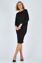Model Chelsea wearing size 10 of The Multiin colourWay Dress - Black (Black), from the front, showing the whole outfit