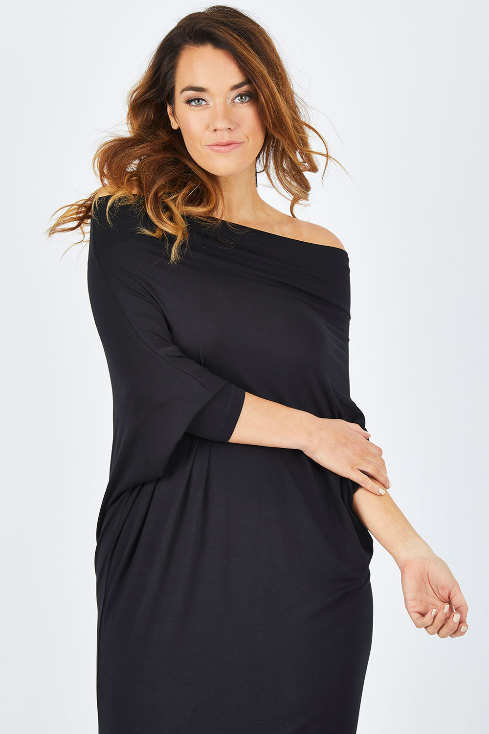 Model Laura wearing size 14 of The Multiin colourWay Dress - Black (Black), from the front, cropped image