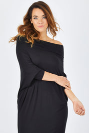 Model Laura wearing size 14 of The Multiin colourWay Dress - Black (Black), from the front, cropped image