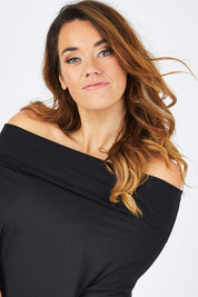 Model Laura wearing size 14 of The Multiin colourWay Dress - Black (Black), from the front, cropped image