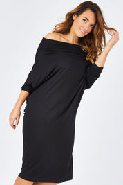 Model Laura wearing size 14 of The Multiin colourWay Dress - Black (Black), from the front, cropped image
