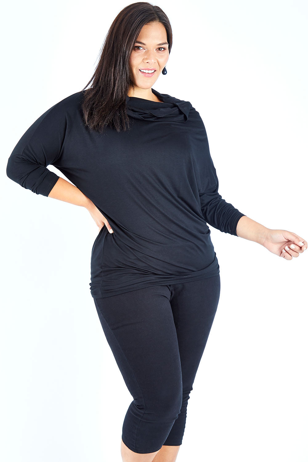 Model Lauren wearing size 18 of The Multiin colourWay Dress - Black (Black), from the front, cropped image
