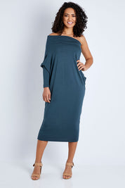Model Pamela wearing size 10 of The Multiin colourWay Dress - Forest (Green), from the front, showing the whole outfit