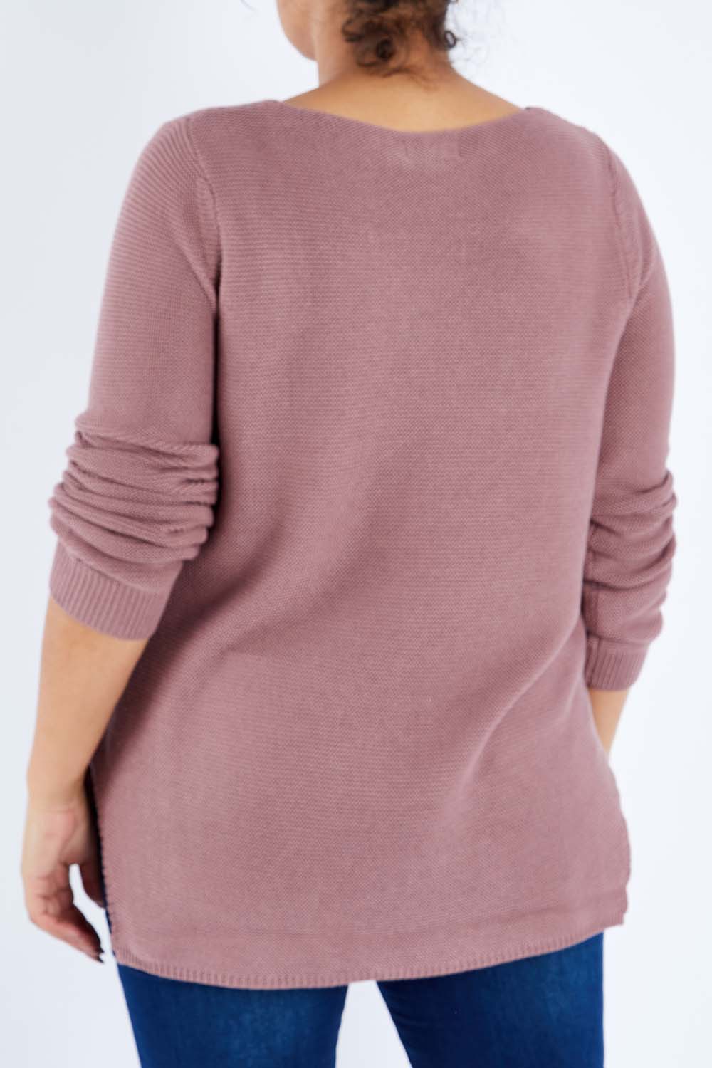 Model Sasha-Lee wearing size XL of The Relaxed V Neck Pullover in colour Dustyrose (Pink), from the back