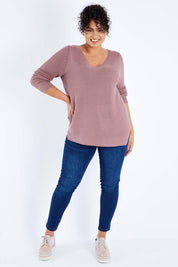 Model Sasha-Lee wearing size XL of The Relaxed V Neck Pullover in colour Dustyrose (Pink), from the front, showing the whole outfit
