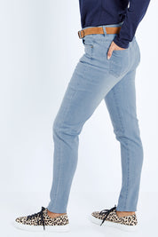 Model Kimberley wearing size 10 of The Mid Rise Skinny Jean in colour Lightdenim (Blue), from the back