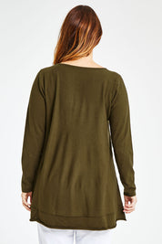 Model Laura wearing size L of The Swing Knit in colour Khaki (Green), from the back