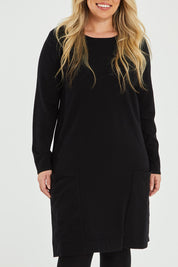 Model Katie wearing size XL of The Pocket Detail Dress in colour Black (Black), from the front, cropped image