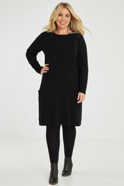 Model Katie wearing size XL of The Pocket Detail Dress in colour Black (Black), from the front, showing the whole outfit