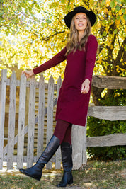 Model Amanda wearing size S of The Pocket Detail Dress in colour Burgundy (Red), from the front, showing the whole outfit