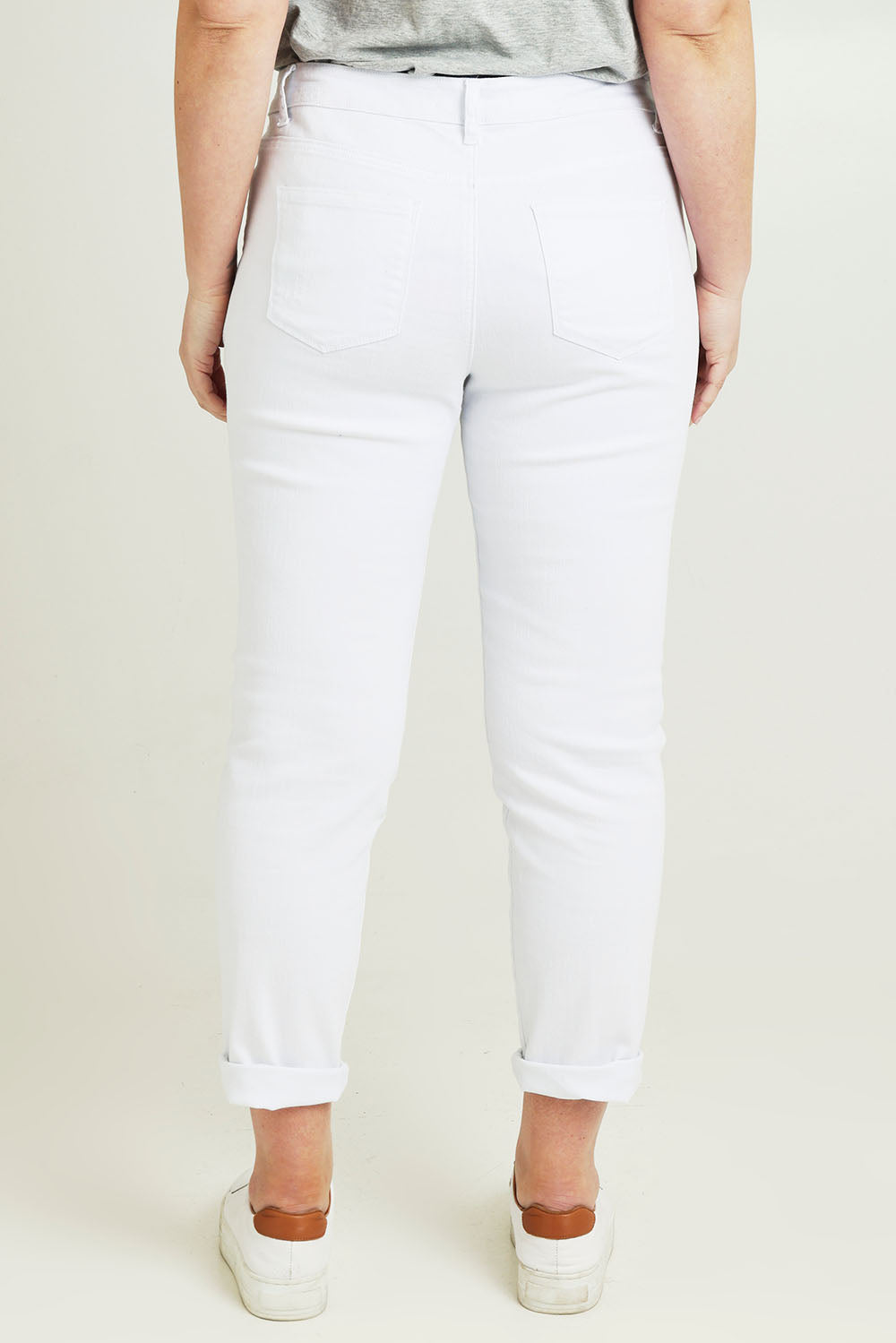 Model Jane wearing size 14 of The Distressed Boyfriend Slim Leg Jean in colour White (White), from the back