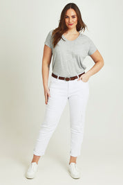 Model Jane wearing size 14 of The Distressed Boyfriend Slim Leg Jean in colour White (White), from the front, showing the whole outfit