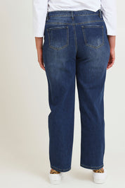 Model Chanel wearing size 16 of The Distressed Boyfriend Jean in colour Mediumblue (Blue), from the back