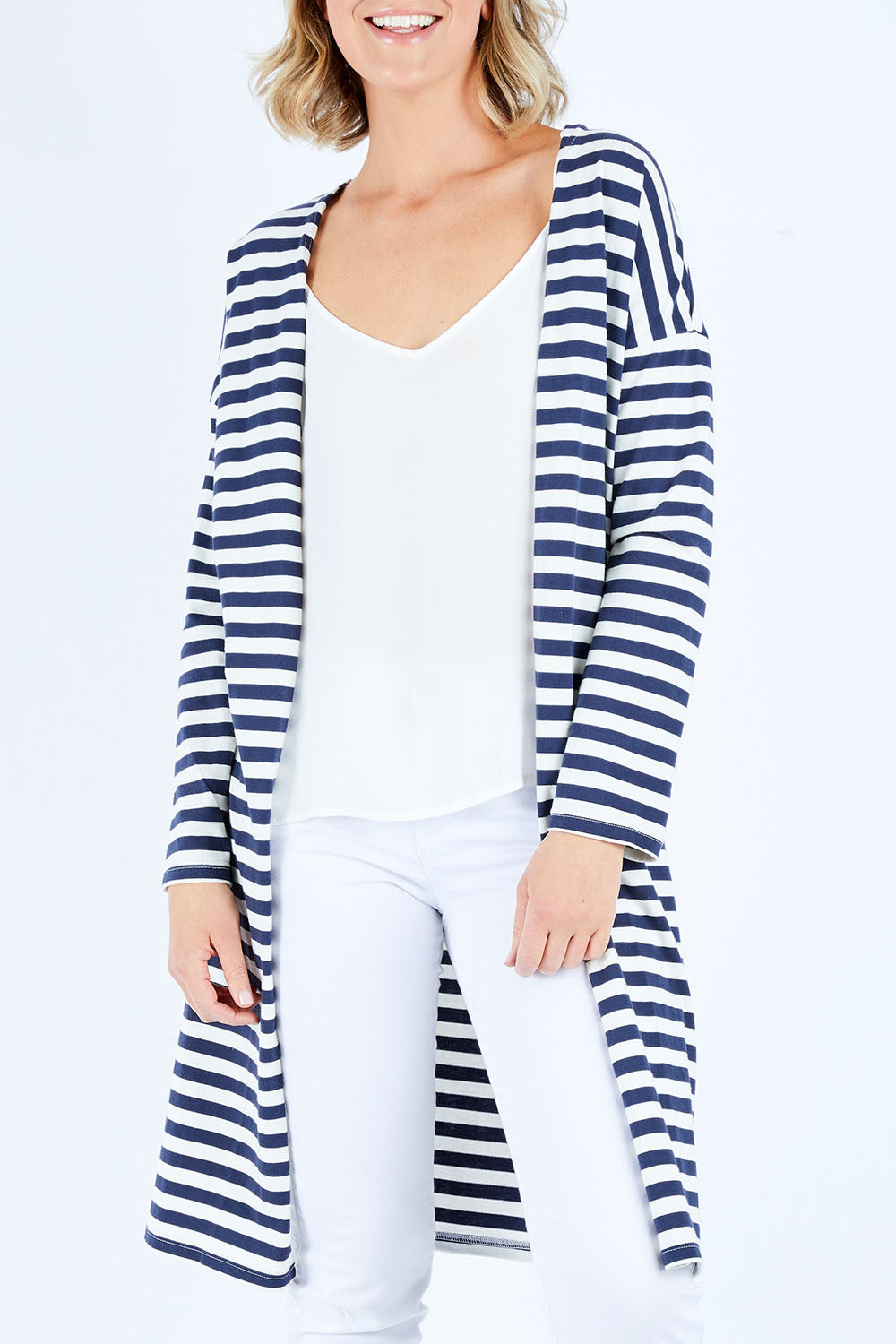 Model Chelsea wearing size 10 of The Relaxed Cotton Cardi in colour Navystripe (Blue), from the front, cropped image