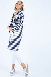 Model Chelsea wearing size 10 of The Relaxed Cotton Cardi in colour Navystripe (Blue), from the front, showing the whole outfit