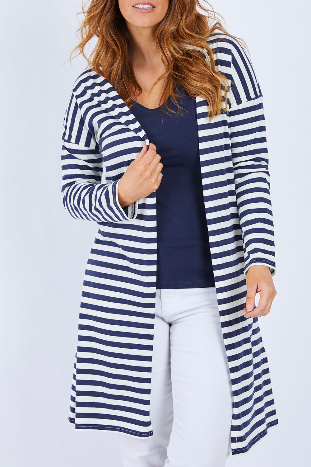 Model Laura wearing size 14 of The Relaxed Cotton Cardi in colour Navystripe (Blue), from the front, cropped image