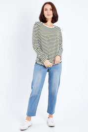 Model Andrea wearing size 10 of The Relaxed Cotton Long Sleeve Tee in colour Khaki (Green), from the front, showing the whole outfit